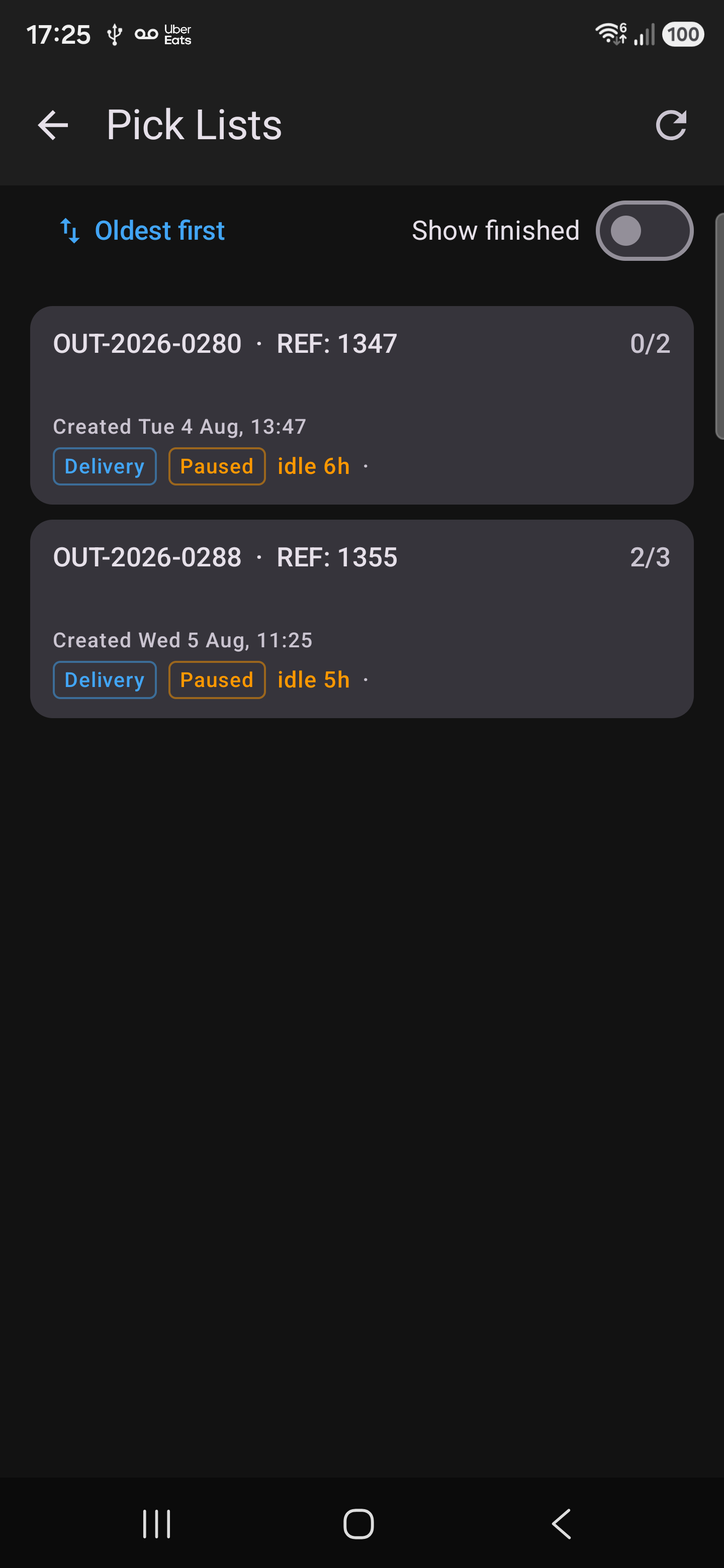Gun app Pick Lists screen showing two outbound orders, their reference numbers, pick progress and how long each has been idle